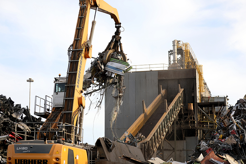 Machines take the large chunks of metal and send them to the shredder