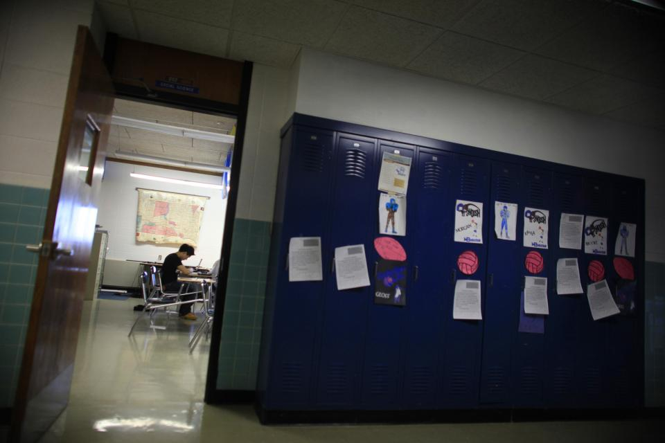 Photo of student in a classroom