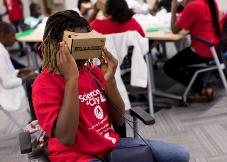 Photo of kids using cardboard VR viewers